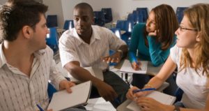 Four students talking