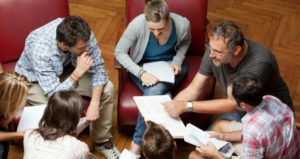 professor with small group of students