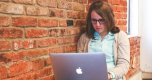 student studying on laptop