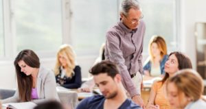 students working college classroom