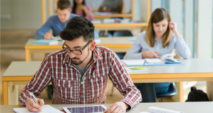 students writing in class