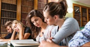 students studying at library