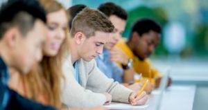 group of students taking exam