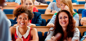 College students laughing during a lecture