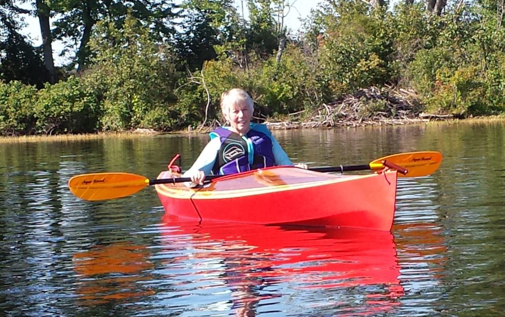Maryellen Weimer in a kayak on a lake