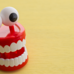 Windup plastic teeth with big eyes