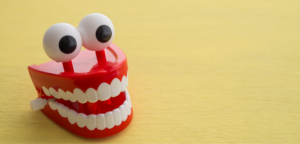 Windup plastic teeth with big eyes