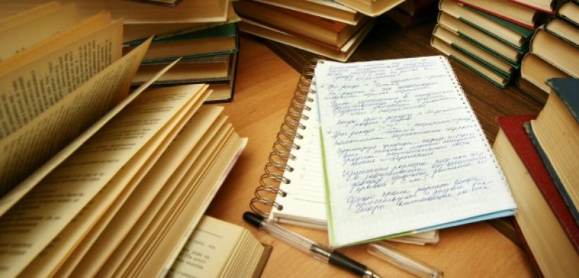 pile of books and notebook